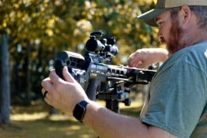 Author inspecting the Tenpoint Titan X crossbow