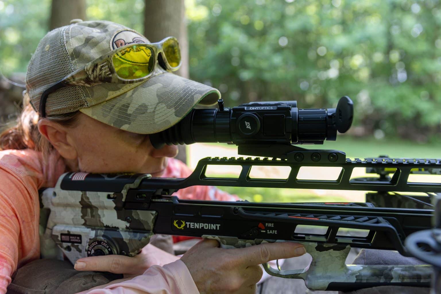 Author reviewing the DNT Zulus HD V2 LRF on a TenPoint TX Ultra 29.5