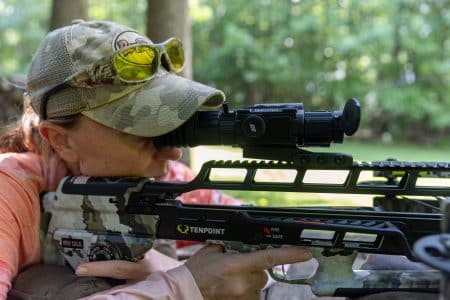 Author reviewing the DNT Zulus HD V2 LRF on a TenPoint TX Ultra 29.5