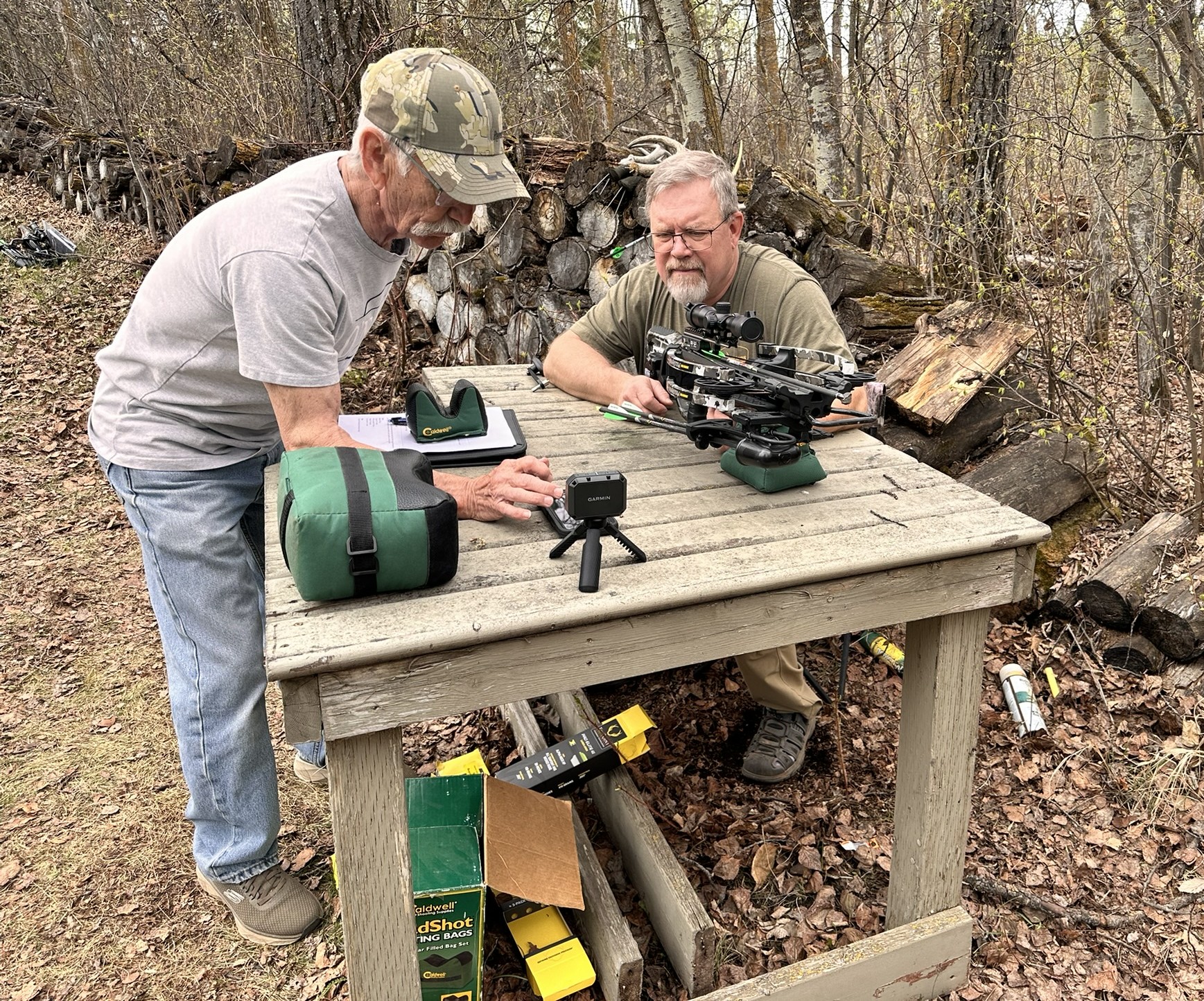 Brad Fenson shooting a crossbow
