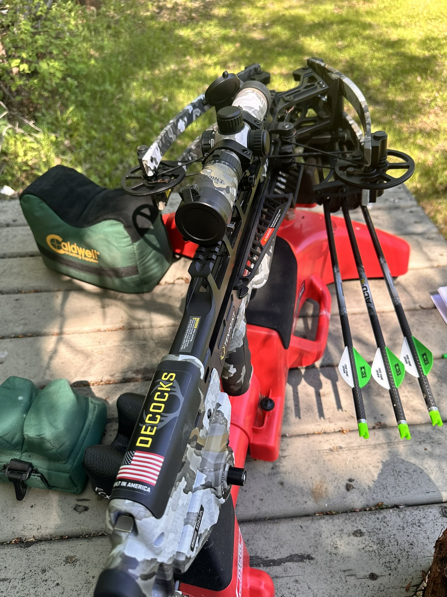 crossbow on a bench