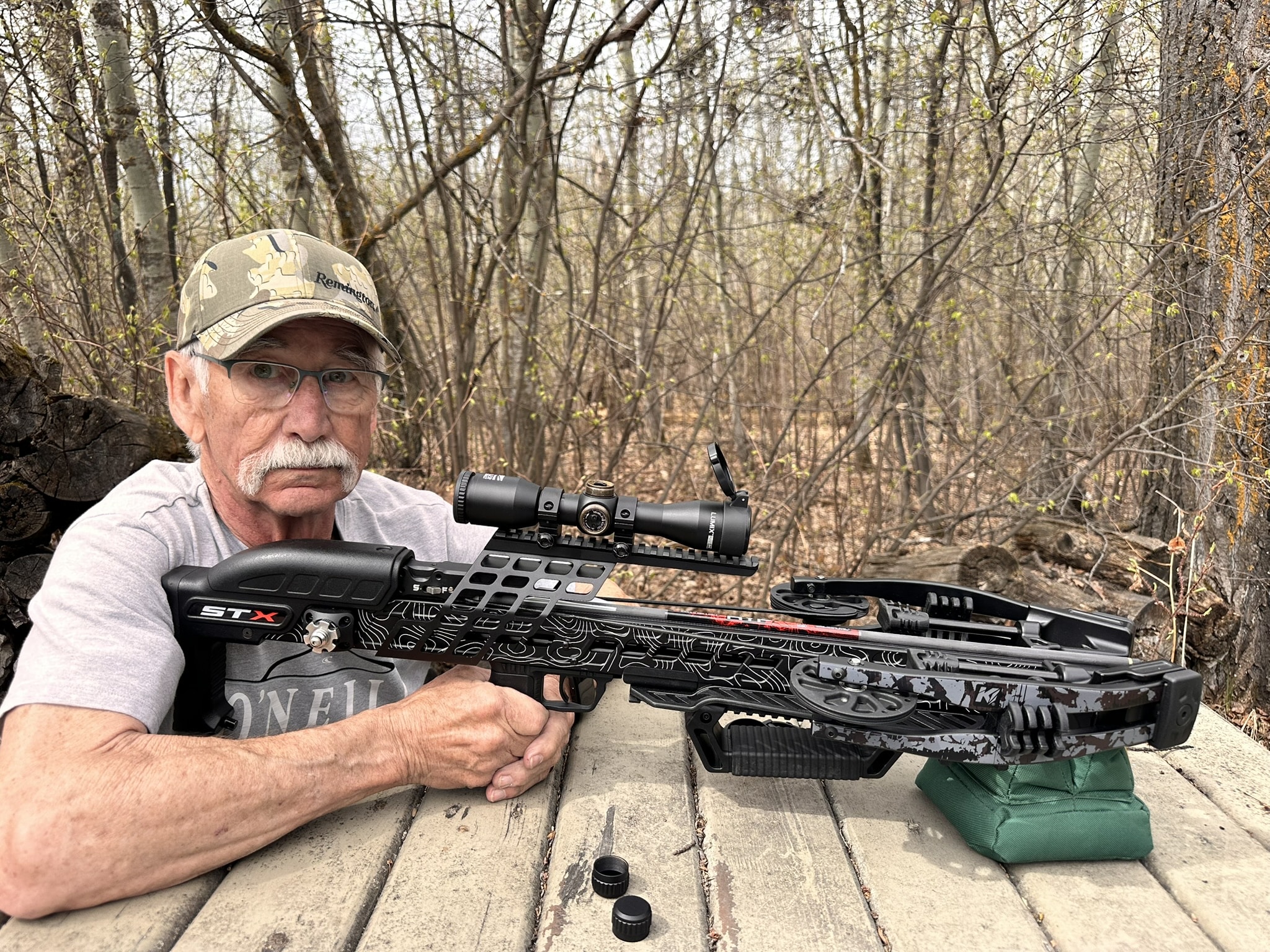 author shooting a crossbow