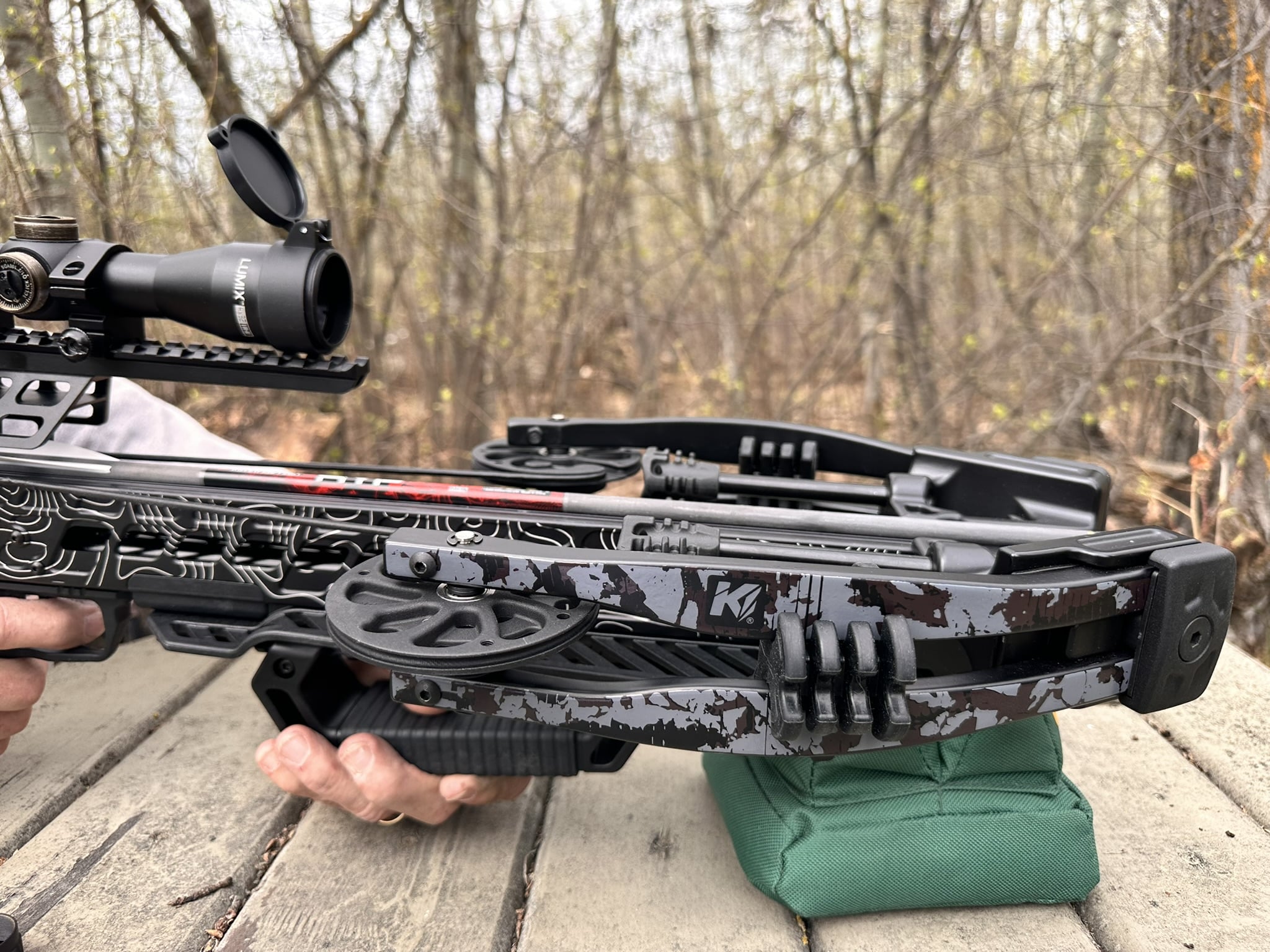 author shooting a crossbow